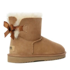 UGG Premium Mini Bow Boots -Chic Clothing Store C2 9d65ae5b a874 4c17 8ce6 4f73bed832bf